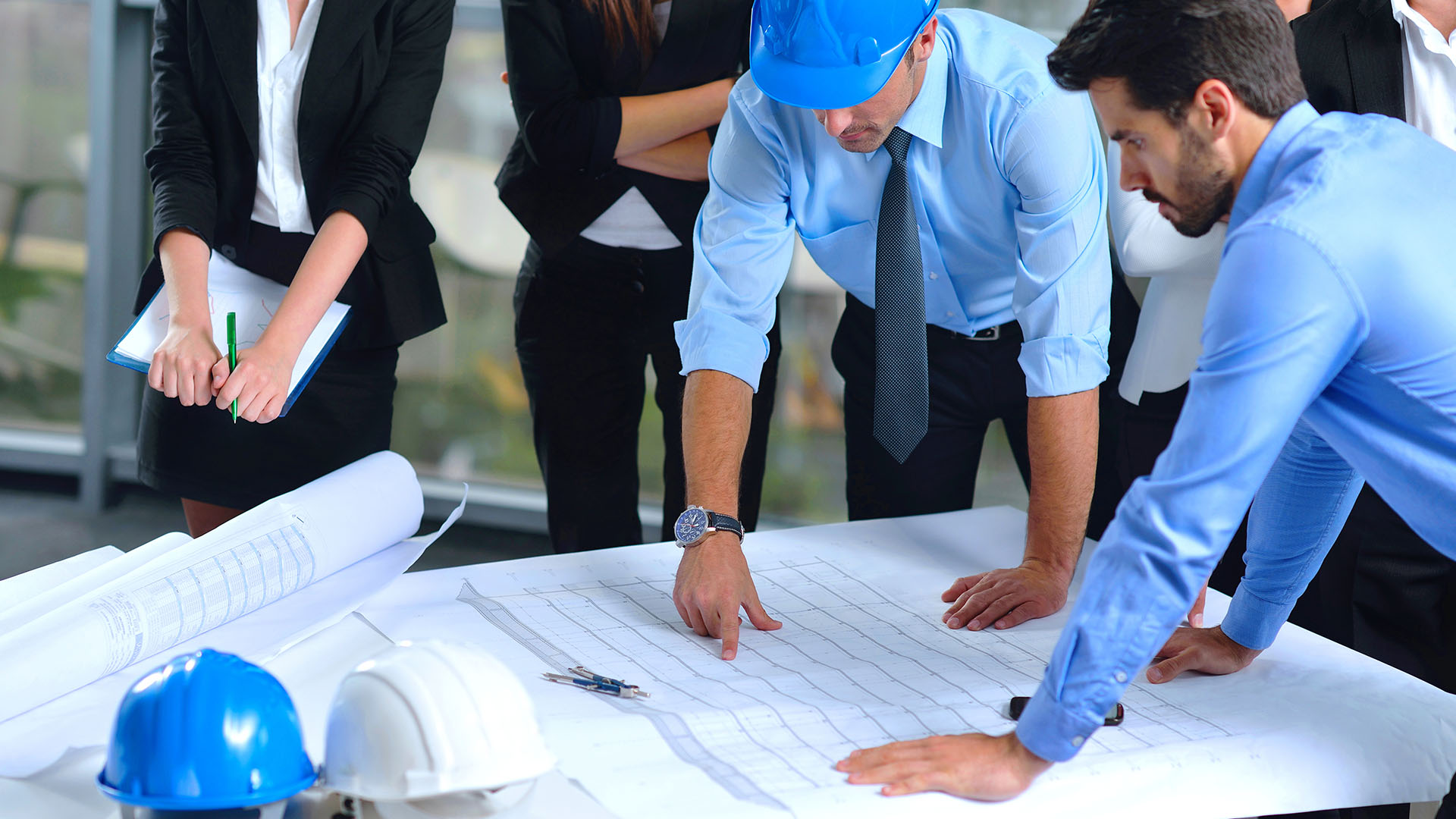 Construction drawings on a job-site table